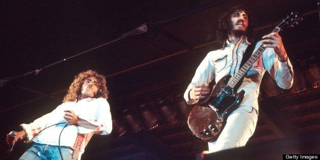 Rock band The Who perform on stage at The Oval cricket ground, London, 18th September 1971. L-R Roger Daltrey, Pete Townshend. Townsend is playing a Gibson SG Special guitar. (Photo by Michael Putland/Getty Images)