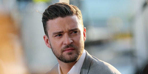 US actor and singer Justin Timberlake smiles on May 20, 2013 as he takes part in the show 'Le Grand Journal' on the set of th
