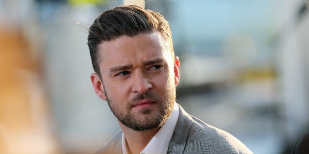 US actor and singer Justin Timberlake smiles on May 20, 2013 as he takes part in the show 'Le Grand Journal' on the set of the French TV Canal+, on the sidelines the 66th Cannes film festival in Cannes. Cannes, one of the world's top film festivals, opened on May 15 and will climax on May 26 with awards selected by a jury headed this year by Hollywood legend Steven Spielberg. AFP PHOTO / LOIC VENANCE (Photo credit should read LOIC VENANCE/AFP/Getty Images)