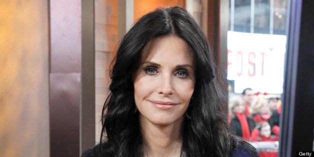 GOOD MORNING AMERICA - Courteney Cox of ABC's 'Cougar Town' appears on 'Good Morning America,' 2/14/12. The hit comedy 'Cougar Town' makes its third season premiere TUESDAY, FEB. 14 (8:30-9:00 p.m., ET) on the ABC Television Network. (Photo by Lou Rocco/ABC via Getty Images) Courteney Cox
