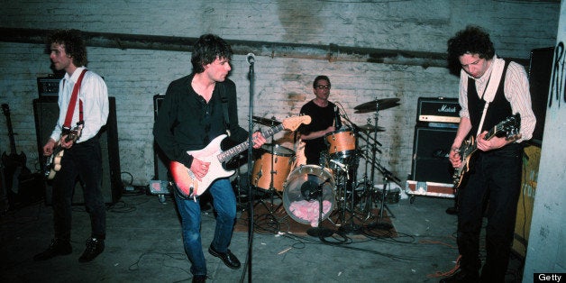 MINNEAPOLIS - DECEMBER 15: The Replacements (L-R) Tommy Stinson-Bass, Paul Westerberg-Vocals/Guitar, Steve Foley-Drums, Slim Dunlap-Guitar perform for Warner Bros Records staff and friends in the basement of Metro Studios in Minneapolis, Minnesota on December 15, 1990. (Photo by Jim Steinfeldt/Michael Ochs Archives/Getty Images)