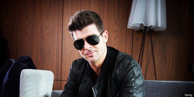 SYDNEY, AUSTRALIA - JUNE 17: (EUROPE AND AUSTRALASIA OUT) American musician Robin Thicke poses during a photo shoot at The Darling hotel on June 17, 2013 in Sydney, Australia. Thicke is in Sydney to perform on the series finale of 'The Voice'. (Photo by Nic Gibson/Newspix/Getty Images)