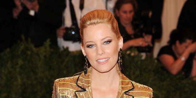 NEW YORK, NY - MAY 06: Elizabeth Banks attends the Costume Institute Gala for the 'PUNK: Chaos to Couture' exhibition at the Metropolitan Museum of Art on May 6, 2013 in New York City. (Photo by Jamie McCarthy/Getty Images for The Huffington Post) 