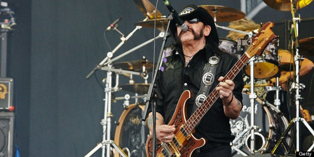 DONNINGTON, UNITED KINGDOM - JUNE 15: Lemmy Kilmister of Motorhead performs on stage on Day 2 of Download Festival 2013 at Donnington Park on June 15, 2013 in Donnington, England. (Photo by Gary Wolstenholme/Redferns via Getty Images)