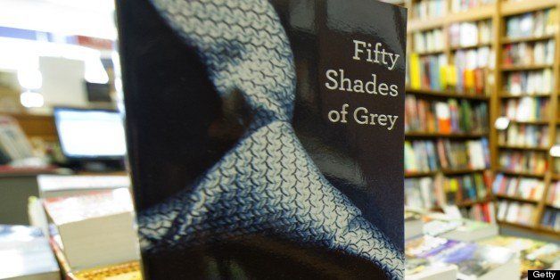 Copies of the book 'Fifty Shades of Grey' by E. L. James are seen for sale at the Politics and Prose Bookstore in Washington, DC, August 3, 2012. The first part of an erotic trilogy, the book has spent the past 22 weeks in the number one spot of the New York Times bestseller's list for fiction. AFP PHOTO / Saul LOEB (Photo credit should read SAUL LOEB/AFP/GettyImages)