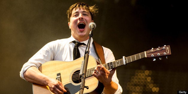 LONDON, UNITED KINGDOM - JULY 06: Marcus Mumford of Mumford & Sons performs at their biggest headline show to date during the