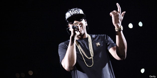 US rapper Jay-Z performs during a concert as part of their tour 'Watch the Throne' on June 1, 2012 in Paris Bercy. AFP PHOTO