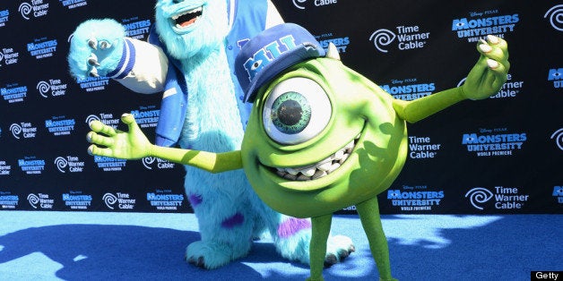 HOLLYWOOD, CA - JUNE 17: Characters James Sullivan and Mike Wazowski attend the premiere of Disney Pixar's 'Monsters University' at the El Capitan Theatre on June 17, 2013 in Hollywood, California. (Photo by Jason Kempin/Getty Images)