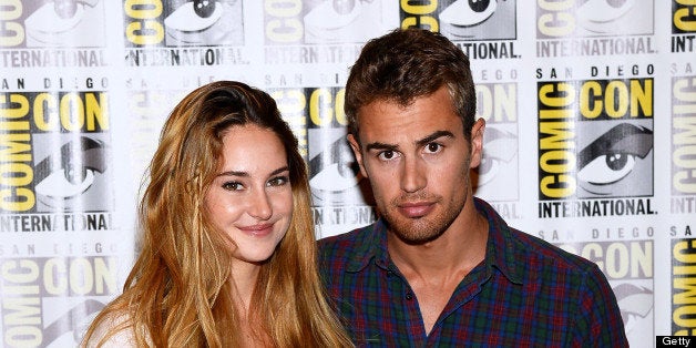 SAN DIEGO, CA - JULY 18: Actress Shailene Woodley (L) and actor Theo James attend 'Enders Game' and 'Divergent' Press Line during Comic-Con International 2013 at Hilton San Diego Bayfront Hotel on July 18, 2013 in San Diego, California. (Photo by Ethan Miller/Getty Images)