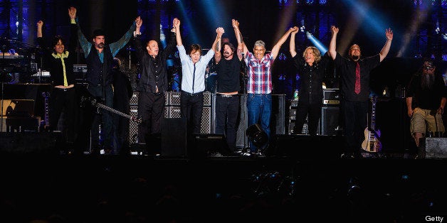 SEATTLE, WA - JULY 19: Sir Paul McCartney performs on stage with members of Nirvana at Safeco Field on July 19, 2013 in Seattle, Washington. (Photo by Mat Hayward/FilmMagic)