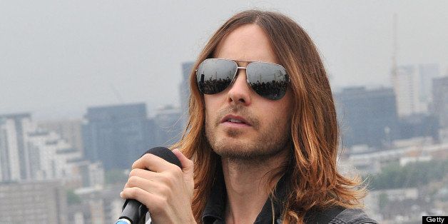 LONDON, ENGLAND - JUNE 18: Jared Leto of American rock band 30 Seconds To Mars performs during an acoustic set on top of The 02 Arena as the band announce a UK & Ireland tour, at 02 Arena on June 18, 2013 in London, England. The event also marks the first anniversary of the 'Up at the O2' roof walk experience. (Photo by Jim Dyson/WireImage)