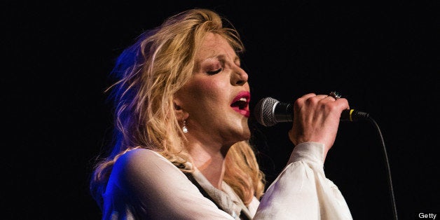 SEATTLE, WA - JULY 23: Courtney Love performs on stage at The Moore Theater on July 23, 2013 in Seattle, Washington. (Photo by Mat Hayward/FilmMagic)