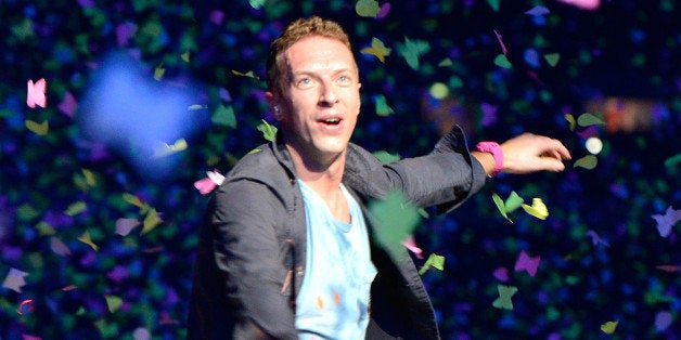 BRISBANE, AUSTRALIA - NOVEMBER 21: Chris Martin of Coldplay performs live for fans at Suncorp Stadium on November 21, 2012 i