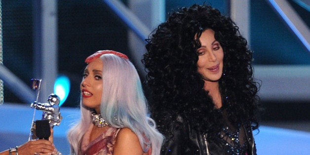 LOS ANGELES, CA - SEPTEMBER 12: Singer Lady Gaga accepts the Video of the Yearaward from Cher onstage during the 2010 MTV Video Music Awards at NOKIA Theatre L.A. LIVE on September 12, 2010 in Los Angeles, California. (Photo by Kevin Winter/Getty Images)