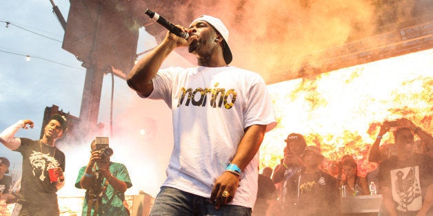 WASHINGTON, DC - August 17th, 2013 - Rapper A$AP Ferg performs at the 2013 Trillectro Festival at the Half Street Fairgrounds in Washington, D.C. while a crowd gathers at the back of the stage. (Photo by Kyle Gustafson / For The Washington Post via Getty Images)