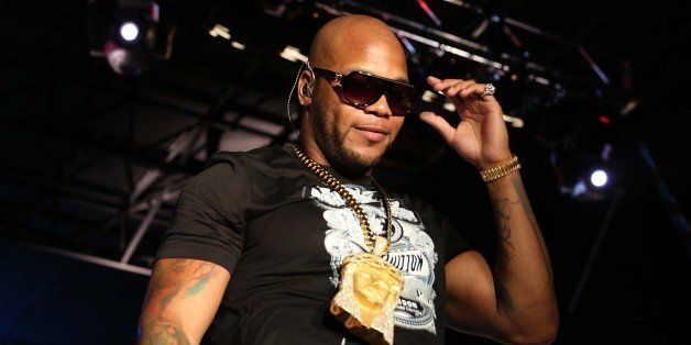 HALLANDALE, FL - AUGUST 17: Flo Rida performs at Gulfstream Park on August 17, 2013 in Hallandale, Florida. (Photo by Aaron Davidson/Getty Images)