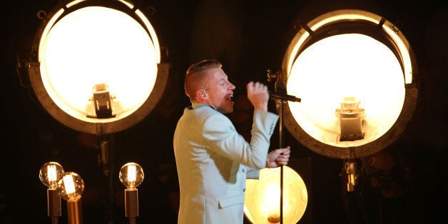 NEW YORK, NY - AUGUST 25: Macklemore performs onstage during the 2013 MTV Video Music Awards at the Barclays Center on August 25, 2013 in the Brooklyn borough of New York City. (Photo by Neilson Barnard/Getty Images for MTV)