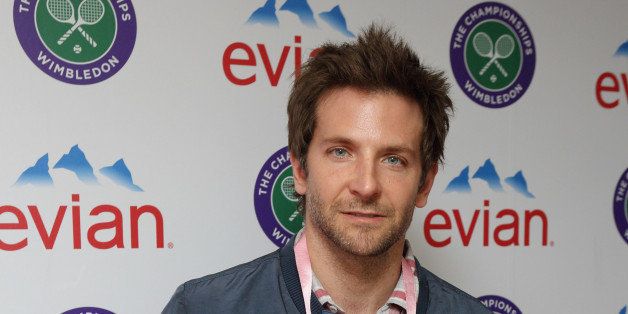 LONDON, ENGLAND - JULY 05: Bradley Cooper poses for Evian as he attends Day 11 of the Wimbledon 2013 championships at Wimbledon on July 5, 2013 in London, England. (Photo by Neil P. Mockford/WireImage)