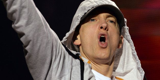 US rapper Eminem performs on August 22, 2013 during a concert at the Stade de France in Saints-Denis, near Paris. AFP PHOTO / PIERRE ANDRIEU (Photo credit should read PIERRE ANDRIEU/AFP/Getty Images)