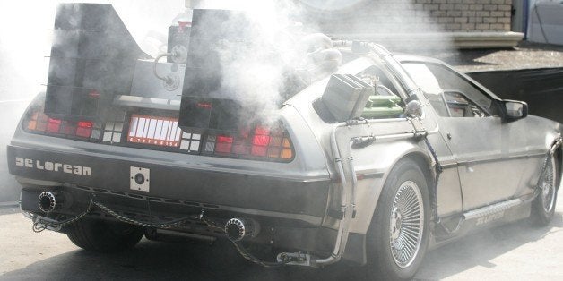 LOS ANGELES, CA - AUGUST 02: Actor Christopher Lloyd inside the DeLorean arrives at the Countdown to the Final Flight of the