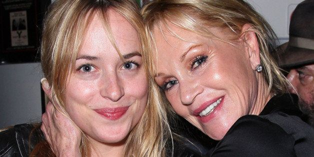 BURBANK, CA - JUNE 03: Actress Dakota Johnson (L) and mother actress Melanie Griffith pose at the opening night of 'No Way Around But Through' at the Falcon Theatre on June 3, 2012 in Burbank, California. (Photo by David Livingston/Getty Images)