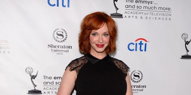 UNIVERSAL CITY, CA - AUGUST 19: Actress Christina Hendricks arrives at the Academy of Television Arts & Sciences' Performers Peer Group cocktail reception to celebrate the 65th Primetime Emmy Awards at Sheraton Universal on August 19, 2013 in Universal City, California. (Photo by Mark Davis/Getty Images)