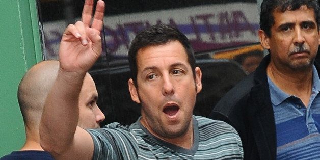 NEW YORK, NY - JULY 10: TV Actor Adam Sandler leaves the 'Good Morning America' taping at the ABC Times Square Studios on July 10, 2013 in New York City. (Photo by Raymond Hall/FilmMagic)