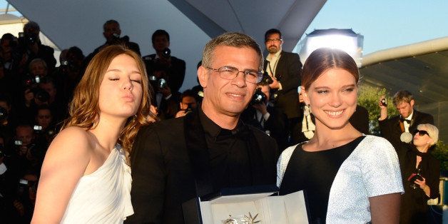 CANNES, FRANCE - MAY 26: (L-R) Actress Adele Exarchopoulos, Director Abdellatif Kechiche and Lea Seydoux pose with the 'Palme d'Or' for 'La Vie D'adele' at the Palme D'Or Winners Photocall during the 66th Annual Cannes Film Festival at the Palais des Festivals on May 26, 2013 in Cannes, France. (Photo by Pascal Le Segretain/Getty Images)