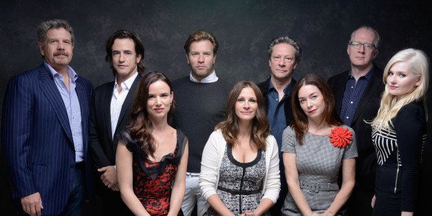 TORONTO, ON - SEPTEMBER 10: (L-R) Director John Wells, actor Dermot Mulroney, actress Juliette Lewis, actor Ewan McGregor, actress Julia Roberts, actor Chris Cooper, actress Julianne Nicholson, screenwriter Tracy Letts and actress Abigail Breslin of 'August: Osage County' pose at the Guess Portrait Studio during 2013 Toronto International Film Festival on September 10, 2013 in Toronto, Canada. (Photo by Jeff Vespa/WireImage)
