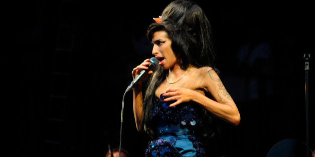 Amy Winehouse performing at the Glastonbury Festival, UK 2008. (Photo by: PYMCA/UIG via Getty Images)