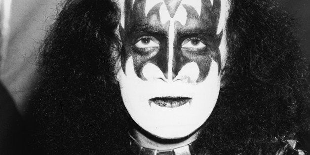 Portrait of Israeli-born American pop singer Gene Simmons of the band KISS as he wears the makeup, leather and chains costume, and hairstyle, that were the band's trademarks, 1970s. (Photo by Darlene Hammond/Getty Images)