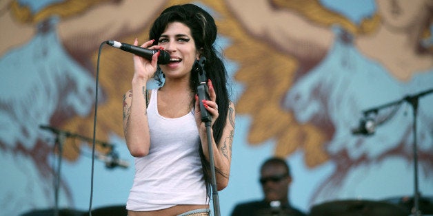 Amy Winehouse during Isle of Wight Festival - Day 2 at Seaclose Park in Newport, Isle of Wight, United Kingdom. (Photo by And