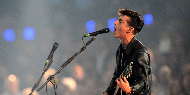 LONDON, ENGLAND - JULY 27: Alex Turner of The Arctic Monkeys performs during the Opening Ceremony of the London 2012 Olympic