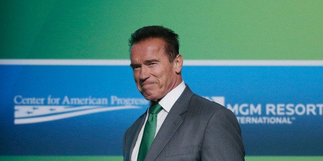 LAS VEGAS, NV - AUGUST 13: Actor and former California Gov. Arnold Schwarzenegger steps onto the stage during the National Clean Energy Summit 6.0 at the Mandalay Bay Convention Center on August 13, 2013 in Las Vegas, Nevada. (Photo by Isaac Brekken/Getty Images for National Clean Energy Summit 6.0)