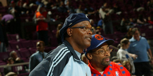 NEW YORK - DECEMBER 12: Actor Samuel L. Jackson, Director Spike Lee and son Satchel stand courtside at the New York Knicks versus Denver Nuggets game on December 12, 2004 at Madison Square Garden in New York City. NOTE TO USER: User expressly acknowledges and agrees that, by downloading and/or using this Photograph, User is consenting to the terms and conditions of the Getty Images License Agreement. (Photo by Ray Amati/Getty Images)