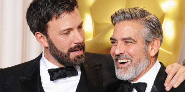 HOLLYWOOD, CA - FEBRUARY 24: Actor/producers Ben Affleck (L) and George Clooney pose in the press room during the Oscars at the Loews Hollywood Hotel on February 24, 2013 in Hollywood, California. (Photo by Steve Granitz/WireImage)