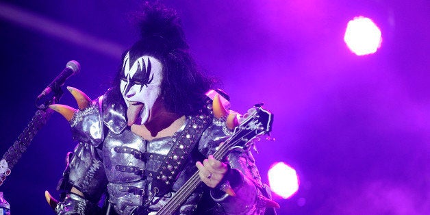 The bassist of US rock band Kiss Gene Simmons performs on stage during the Hellfest Heavy Music Festival on June 22, 2013 in