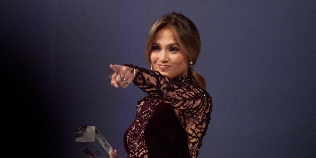 US singer and actress Jennifer Lopez points to the audience as she leaves the stage after receiving the Ally for Equality Awa