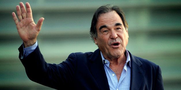 US film director Oliver Stone gestures as he poses during the 61st San Sebastian Film Festival where he has presented his documentary film 'The Untold History of the United States', in the northern Spanish Basque city of San Sebastian on September 24, 2013. AFP PHOTO/ RAFA RIVAS (Photo credit should read RAFA RIVAS/AFP/Getty Images)