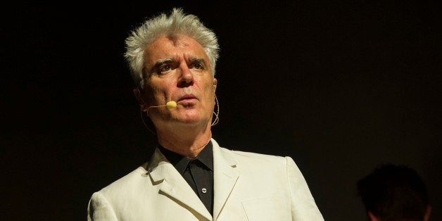 BIRMINGHAM, UNITED KINGDOM - AUGUST 28: David Byrne performs on stage at Symphony Hall on August 28, 2013 in Birmingham, England. (Photo by Steve Thorne/Redferns via Getty Images)