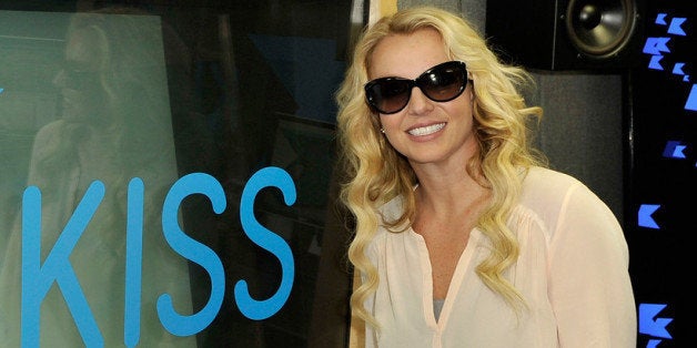 LONDON, ENGLAND - OCTOBER 16: (EXCLUSIVE COVERAGE) Britney Spears visits Rickie, Melvin and Charlie In The Morning at the K