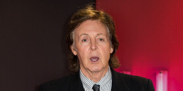 LONDON, ENGLAND - OCTOBER 18: Paul McCartney meets fans and signs copies of his album 'New' at HMV, Oxford Street on October 18, 2013 in London, England. (Photo by Ian Gavan/Getty Images)