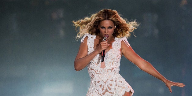 RIO DE JANEIRO, BRAZIL - SEPTEMBER 13: Singer Beyonce performs on stage during a concert in the Rock in Rio Festival on September 13, 2013 in Rio de Janeiro, Brazil. (Photo by Buda Mendes/Getty Images)