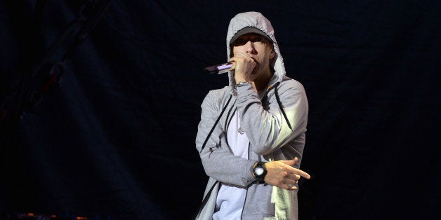 US rapper Eminem performs on August 22, 2013 during a concert at the Stade de France in Saints-Denis, near Paris. AFP PHO