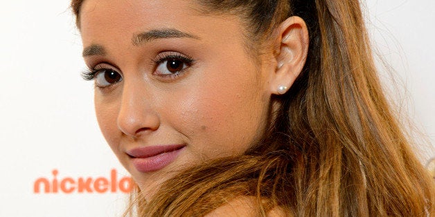 LONDON, ENGLAND - OCTOBER 12: Ariana Grande attends the UK Premiere of Sam & Cat at Cineworld 02 Arena on October 12, 2013 i
