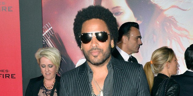 LOS ANGELES, CA - NOVEMBER 18: Musician Lenny Kravitz attends the premiere of Lionsgate's 'The Hunger Games: Cathching Fire'