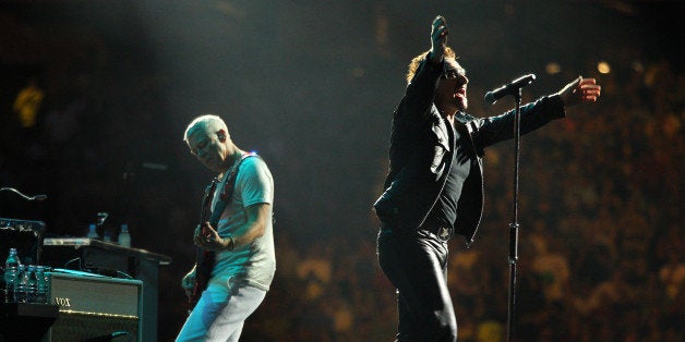 MINNEAPOLIS, MN - JULY 23: Lead singer Bono of U2 performs at TCF Bank Stadium on July 23, 2011 in Minneapolis, Minnesota. (Photo by Adam Bettcher/Getty Images)