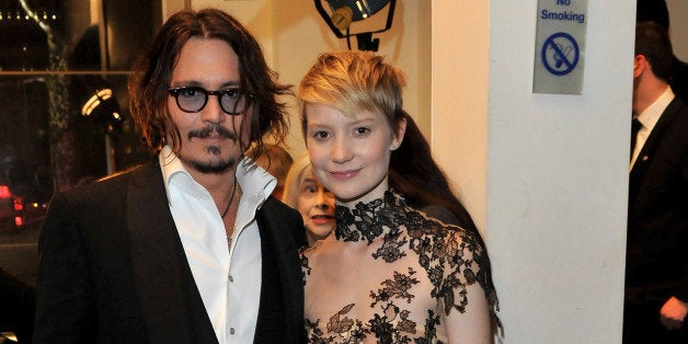 LONDON, ENGLAND - FEBRUARY 25: Actor Johnny Depp and actress Mia Wasikowska attend the Royal World Premiere of Tim Burton's