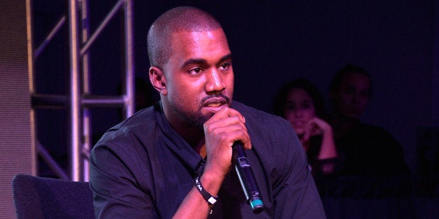 MIAMI, FL - DECEMBER 05: Kanye West speaks at Surface Magazine's DesignDialogues No. 6 With Hans Ulrich Obrist, Kanye West And Jacques Herzog at Moore Building on December 5, 2013 in Miami, Florida. (Photo by Frazer Harrison/Getty Images for Surface Magazine)