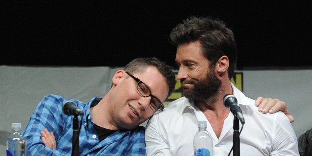 SAN DIEGO, CA - JULY 20: Director Bryan Singer and actor Hugh Jackman speak at the 20th Century Fox 'X-Men: Days of Future P